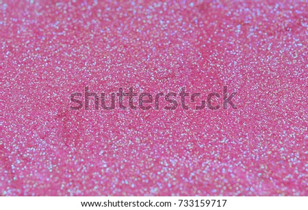 Pink sequins background texture.