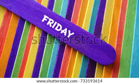 Concept colorful ice cream stick with word FRIDAY