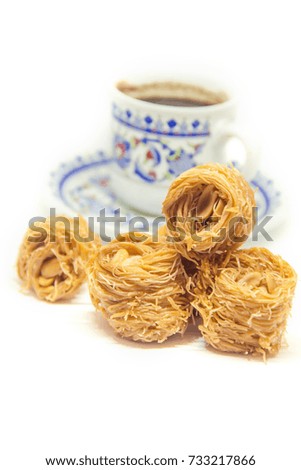 Eastern sweetness, baklava with peanuts and honey. Isolate. Selective focus. 