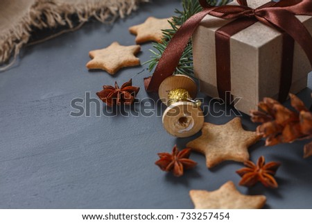 Christmas gingerbread cookies and Christmas gifts. Christmas decorations. Spices. Bumps. Christmas tree. Top view