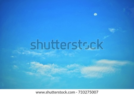 Blue sky, small moon