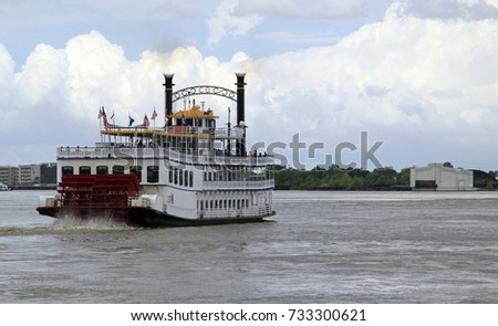 Steamboat on Mississippi river near New Orleans Royalty-Free Stock Photo #733300621