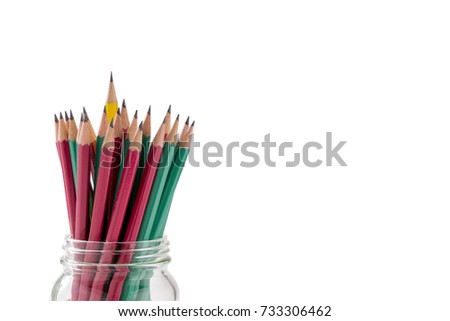 Group of pencils on white background, one yellow pencil popup out of them meaning to think different be leader