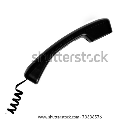 Isolated photo black handset with a twisted cord on a white background
