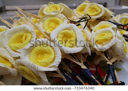Paper flower, kind of wood flower to be placed on the site of cremation, at a Buddhist funeral. Thailand. 