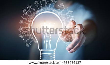 Businessman on blurred background touching renewable eco lightbulb sketch