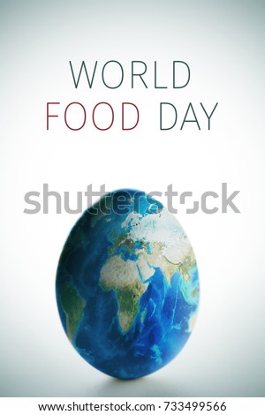 picture of an egg digitally patterned with a world map (furnished by NASA) and the text world food day, on a white background with a slight vignette added