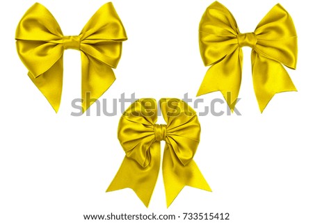 Three satin lemon bows with tails on white background
