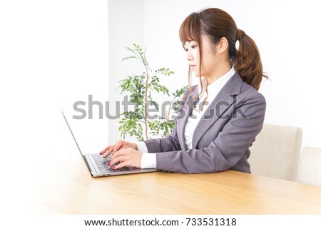 Business woman using a laptop