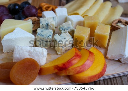 Cheese platter on rustic background