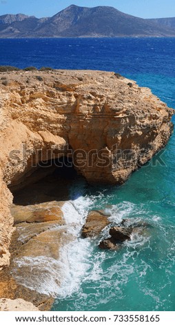 Photo of famous rocky seascape of Koufonisi island with caves and turquoise - sapphire clear waters, Cyclades, Greece                 