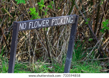 Wooden No Flower Picking sign