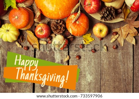 Happy thanksgiving day display on wooden background