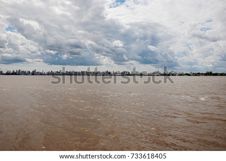 View from the river of Belem do Para skyline, a city located on the north area of Brazil. Cloudy blue sky.