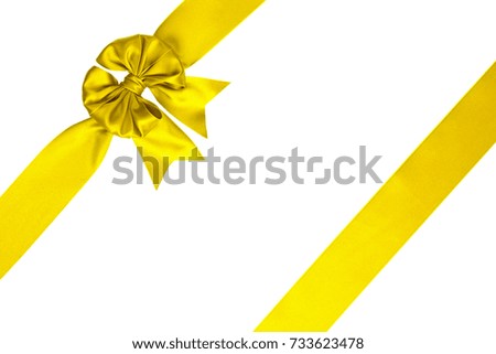 Single lemon yellow satin bow with two ribbons isolated on white 