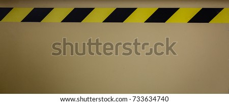 Black and yellow striped tapes restricted area border