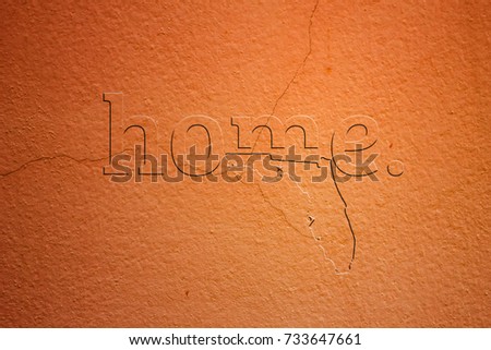 florida map with word-home on orange color wall.