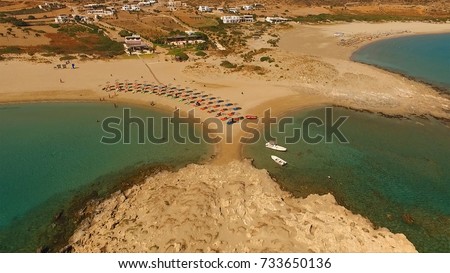 Aerial birds eye view photo taken by drone of famous beach of Manganari, Ios island, Cyclades, Greece