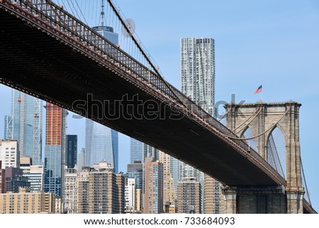 Brooklyn Bridge is a hybrid cable-stayed/suspension bridge in New York City and is one of the oldest bridges in the United States