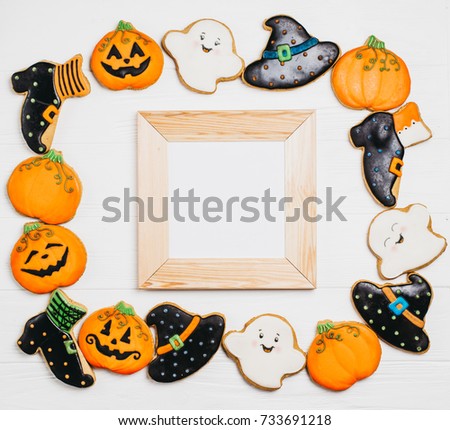 Funny delicious ginger biscuits for Halloween on the table. horizontal view from above