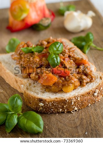 Sandwich of savory ground beef on toasted wholewheat bread. A delicious variety of a Sloppy Joe.