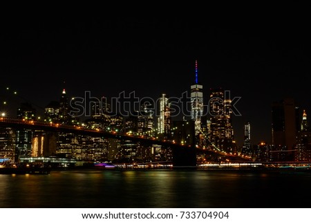New York, the world famous New York skyline with the Brooklyn Bridge 