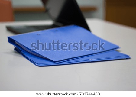  File folder with Documents and Notebook background on white table in meeting room - concept business
