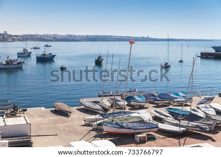 Bay of Cascais. Small sailing boats lay on the pier in summer day. Cascais municipality, Portugal