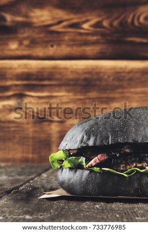 Burger on wooden background