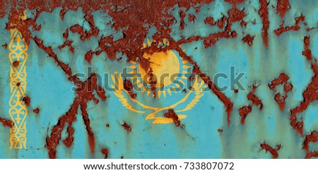 Flag of  Kazakhstan the rusty background.  Concept photo