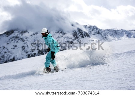 Winter skier and mountains 
