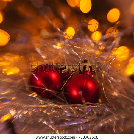 christmas balls before a twinkle background