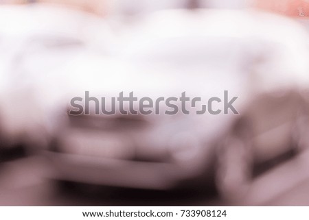 Abstract blurred background with car silhouettes
