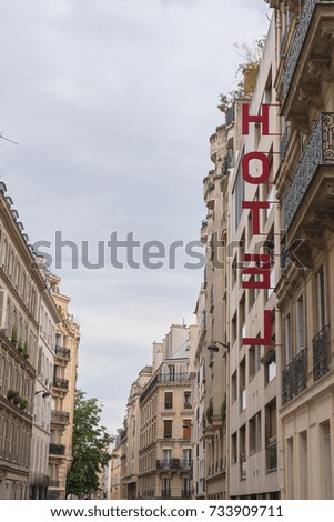     Paris, typical street with the hotel panel, big letters 