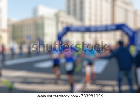 Marathon in the city theme creative abstract blur background with bokeh effect