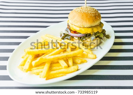 beef burger with french fries - unhealthy food style