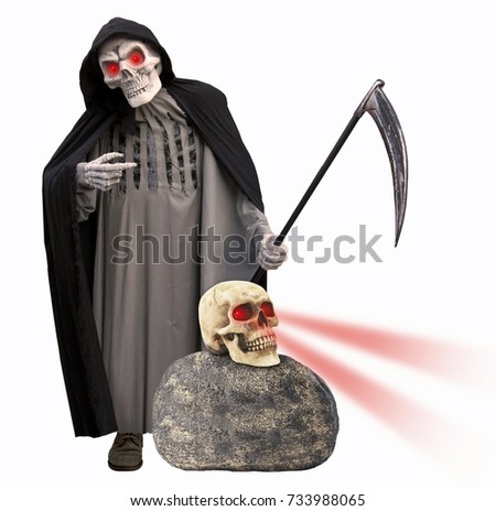 The grim reaper is next to stone A skull is on it.