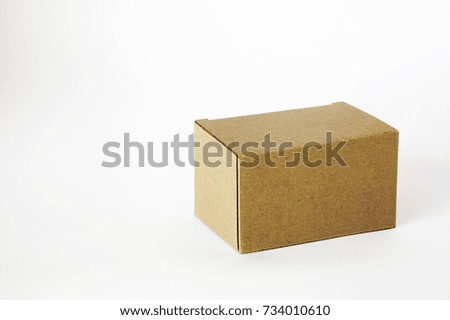 Luggage in the box of cardboard boxes