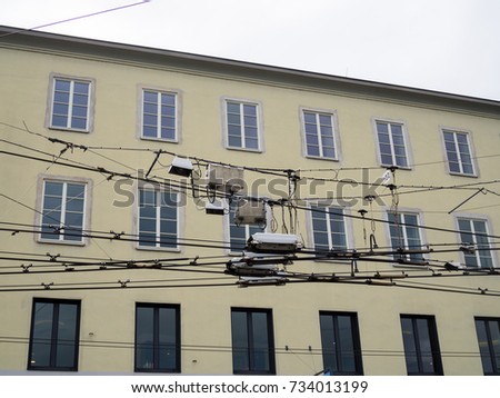 Powerlines wires in Salzburg, Austria, overhead in the city centre for electric trolleybuses