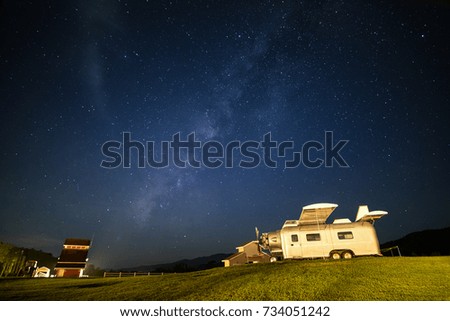 Milky way over airplane propeller in countryside at Singha Park (Boon Rawd Farm), Chiang Rai, Thailand