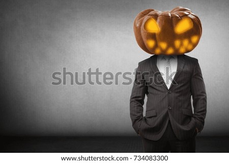Digital composite image of Pumpkin head businessman with copy space