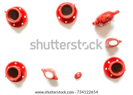 Coffee tea in red mug with a cup of milk and sugar isolated on white background. Top view.