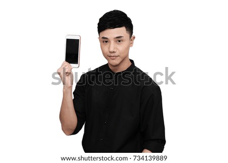 Portrait of a handsome business man, showing a mobile phone with right hand, isolated on white background