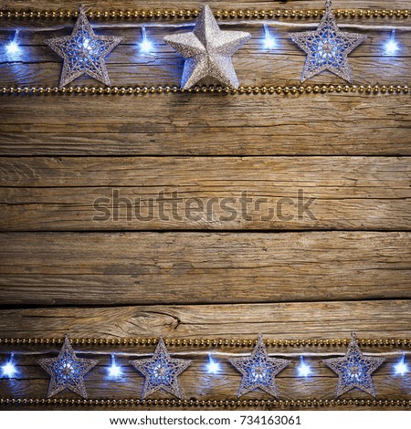 Christmas Background, Christmas star on old wooden table, blue light