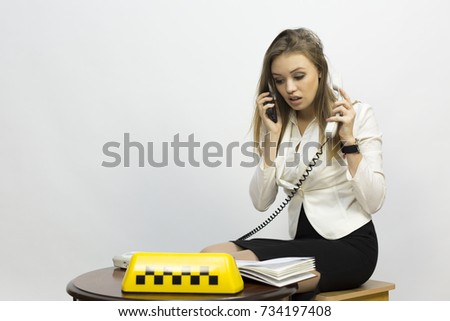 Taxi Advertising Company. The taxi dispatcher - reception of orders, waiting for the car, telephone conversations
