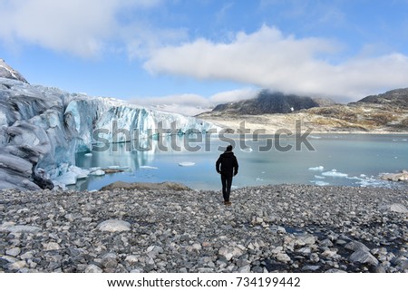 Boy looking at the glacier