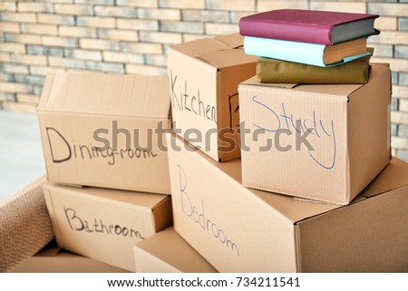Carton boxes in room. Moving house concept