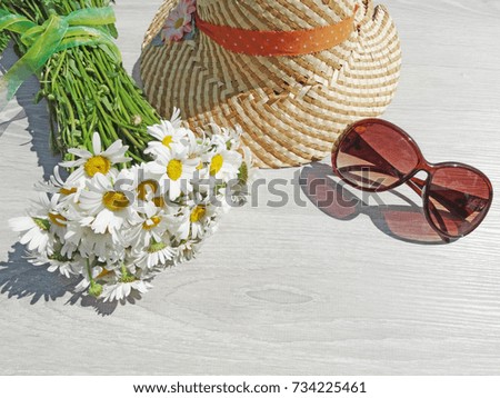 sunglasses daisy flowers and hat summer holiday background concept