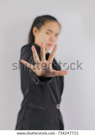 business woman showing stop sign with hand