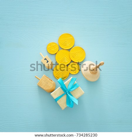 jewish holiday Hanukkah image background with traditional spinnig top and chocolate coins.